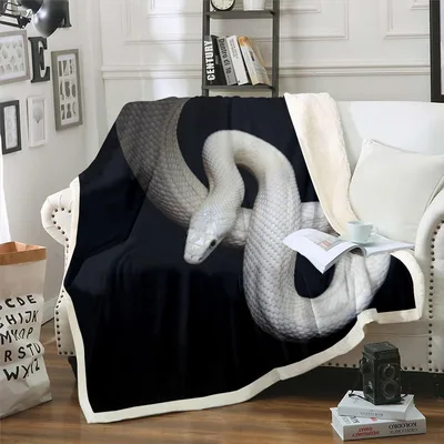 White Snake on Black Blanket: Realistic Reptile Art for Your Sofa