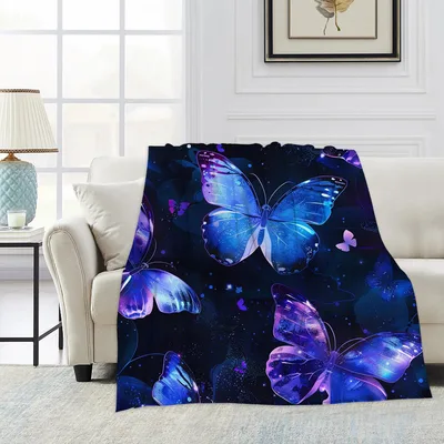 Glowing Blue Butterflies Galaxy Blanket featuring luminous blue