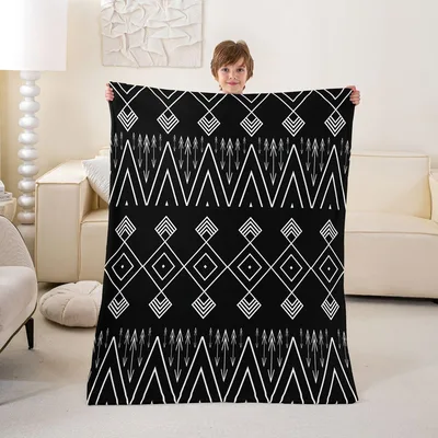 Black and White Aztec Blanket featuring bold tribal triangles