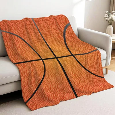 Orange Basketball Close Up Blanket features a giant textured