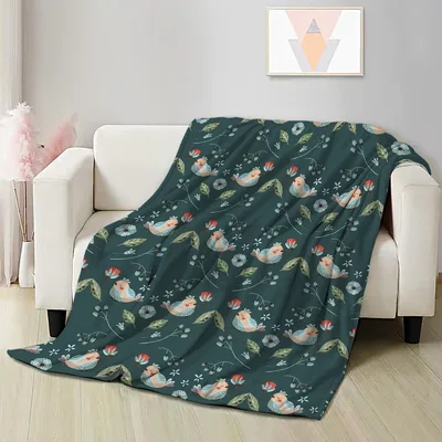 Hummingbirds on Green Blanket: A soft flannel throw