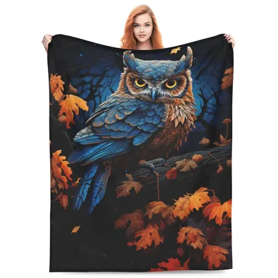 Blue Owl in Autumn Blanket: Blue Bird Perched Among Fall Leaves