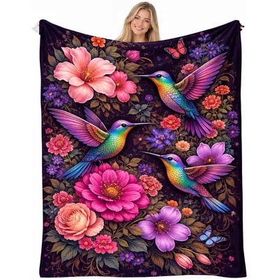 Hummingbirds Among Pink Flowers Blanket features iridescent