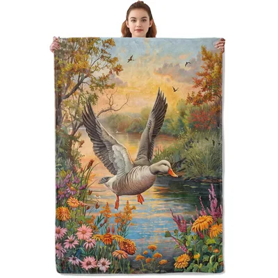 Wild Duck Over Lake Blanket: A Wild Goose Soaring Over Autumn Water