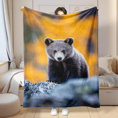 Baby Bear in Autumn Blanket: A Cubs Forest Scene for Nature Lovers