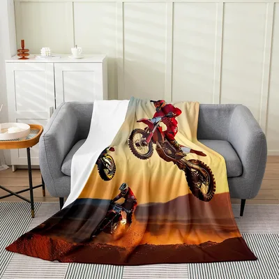 Motocross Rider at Sunset Blanket: Action on a Golden Track