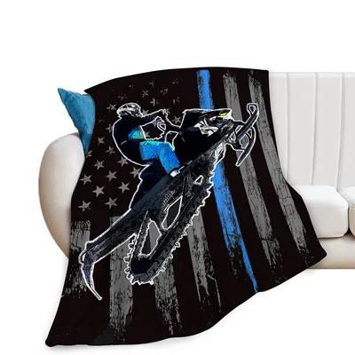 Snowmobile Rider with American Blanket: Action and Flag Design