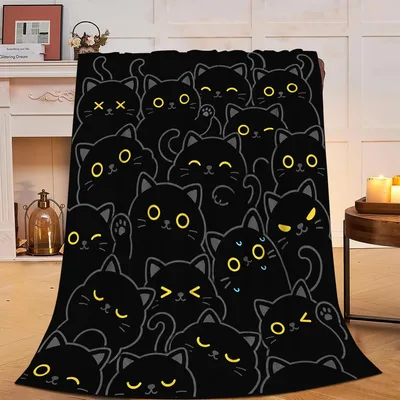 Black Cats with Yellow Blanket: A Pile of Feline Faces