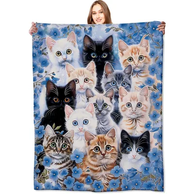 Kittens with Blue Flowers Blanket: A Gathered Portrait of Felines