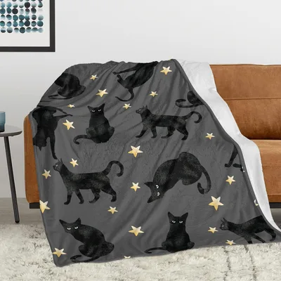 Black Cats Under Golden Blanket: Spooky Feline Art for Cozy Nights