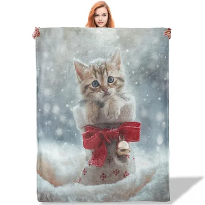 Kitten in Snow Blanket: Festive Feline with Red Bow and Bell