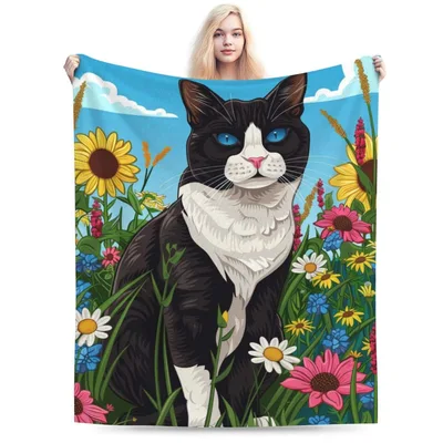 Tuxedo Cat Among Sunflowers Blanket featuring a black