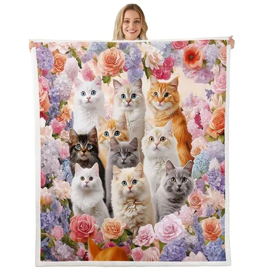 Cute Kitties Among Pink Blanket: Feline Friends in a Floral Garden