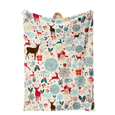 Reindeer and Holly Pattern Blanket featuring festive reindeer