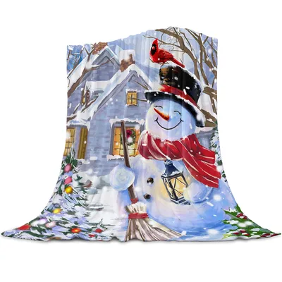 Snowman Cottage Winter Scene Blanket featuring a smiling snowman