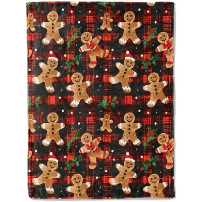 Gingerbread Men on Plaid Blanket featuring festive cookie characters