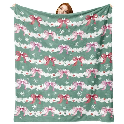 Pink Bows on Mint Blanket: Festive Holiday Design with Pink Ribbons