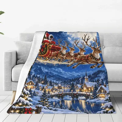 Santa Sleigh Winter Village Blanket features Santa flying