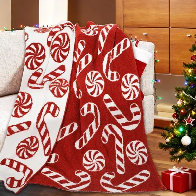 Candy Canes and Peppermints Blanket featuring festive red