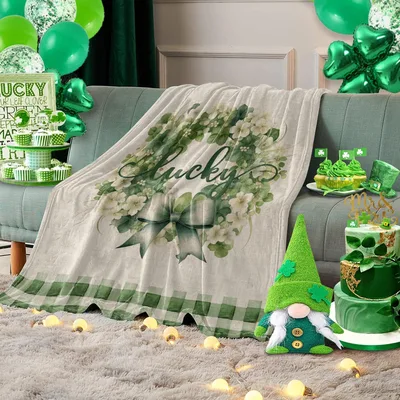 Lucky Leaf Wreath Blanket features elegant script lettering