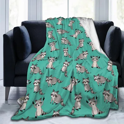 Cartoon Raccoons on Teal Blanket: Playful Animal Pattern for Cozy Days
