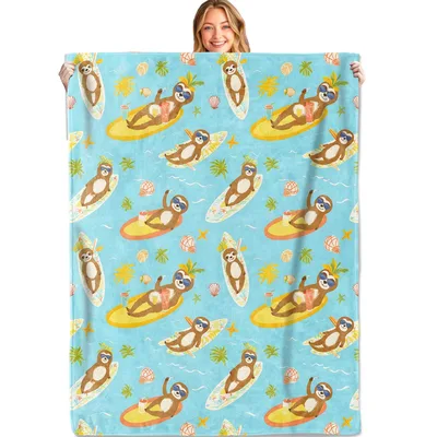 Sloth Surfing Tropical Blanket features relaxed sloths