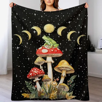 Frog Mushroom Moon Phases Blanket featuring a green toad