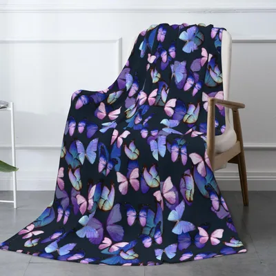 Purple Butterfly Pattern Blanket: Swirling Wings on Dark Background