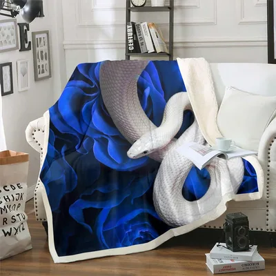 White Snake on Blue Blanket: Serpentine Art for Reptile Lovers