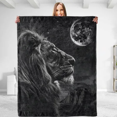 Lion Looking at Moon Blanket: A Monochrome Wildlife Scene