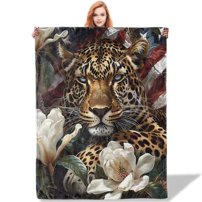 Leopard Among Magnolia Flowers Blanket: Wild Beauty and Soft Petals