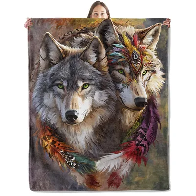 Two Wolves Tribal Feather Blanket featuring two wolf heads