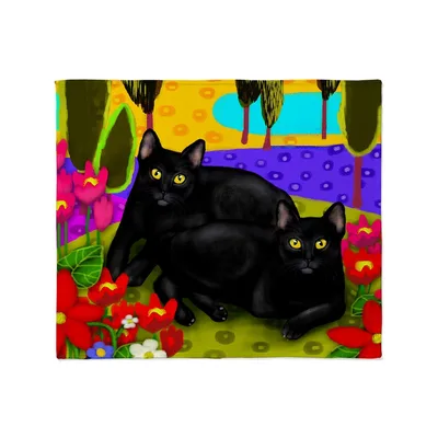 Black Cats in Flower Blanket: Two Felines in a Vibrant Garden