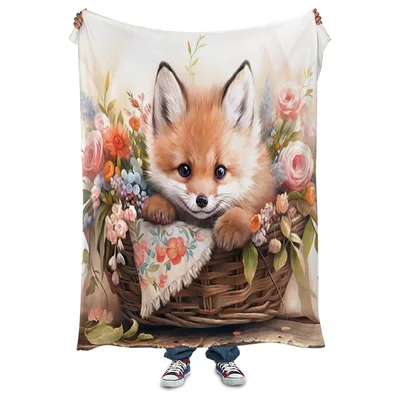 Baby Fox in Flower Blanket: A Cute Fox in a Wicker Basket