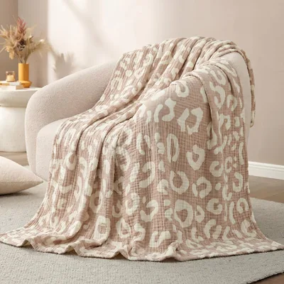 Cream Leopard Animal Print Blanket featuring soft rosettes