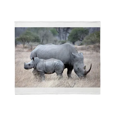 Mother and Baby Rhino Blanket: A Photo of Two Rhinos in the Grass