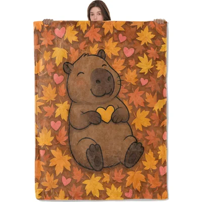 Capybara Sitting in Autumn Blanket: Cute Capybara Holding Heart