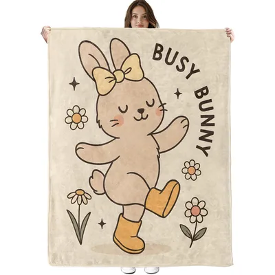 Busy Bunny Flowers Pattern Blanket features a dancing rabbit