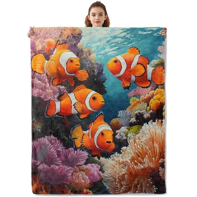 Clownfish in Coral Reef Blanket featuring bright orange fish