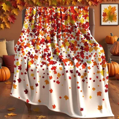 Falling Maple Confetti Blanket features a vibrant pattern