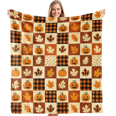 Pumpkin and Autumn Leaf Blanket featuring jack-o'-lanterns