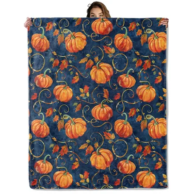 Orange Pumpkins on Navy Blanket: Cozy Fall Pattern with Gold Swirls