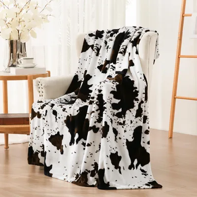 Brown and Ivory Cowhide Blanket: Classic Spotted Pattern for Home