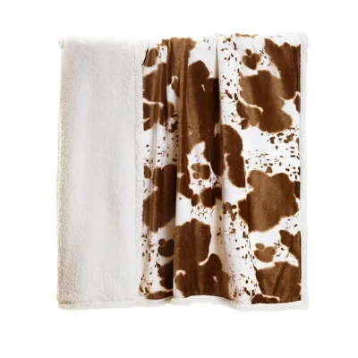 Brown and White Cowhide Blanket for Farm Lovers