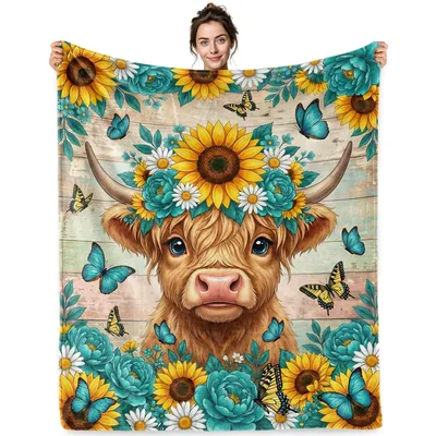 Highland Cow in Sunflower Blanket: Fluffy Calf with Floral Crown