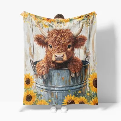 Highland Cow in Galvanized Blanket: Fluffy Calf in a Rustic Tub