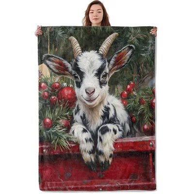 Baby Goat Christmas Blanket featuring a spotted kid
