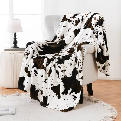Cow Print Pattern Blanket: Classic Black and White Spot Design