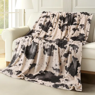 Cow Print Pattern Blanket featuring classic black