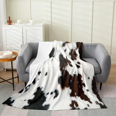 Cowhide Print Pattern Blanket featuring realistic cattle fur spots